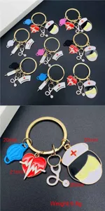Nurse theme alloy keychain set with cute doctor hat stethoscope heart pendants for medical staff.