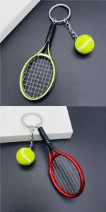 Detail view of tennis keychain with mini racket and ball charm, ideal for sports fans.