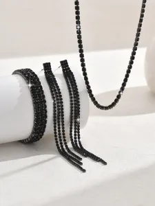 Black rhinestone claw chain jewelry set detail view, featuring sparkling necklace and bracelet.