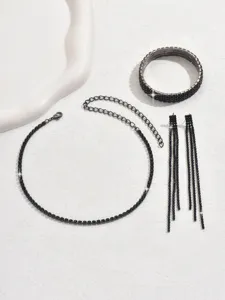 Black rhinestone jewelry set featuring a sparkling choker necklace, chic bracelet, and elegant long earrings.