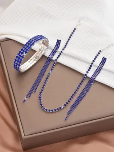 Blue rhinestone jewelry set including crystal necklace, bracelet and earrings for women.