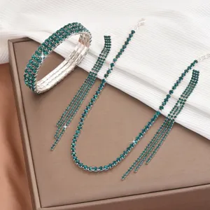 Fashion rhinestone jewelry set featuring crystal claw chain necklace bracelet and matching earrings.