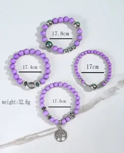 Set bracciali perline viola bohémien da donna con ciondolo albero della vita e design multistrato.