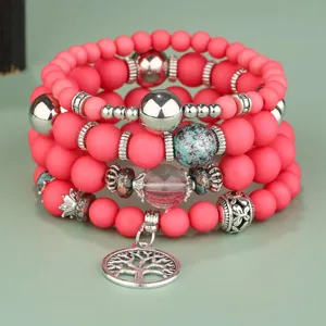 Set di bracciali con perline multistrato boho con perline opache rosa e ciondolo albero della vita donna.