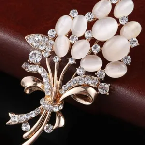 Elegant opal flower brooch for women, sparkling rhinestone crystal bouquet pin accessory.