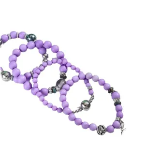 Set di bracciali con perline viola bohémien da donna con ciondolo multistrato e distanziatori.