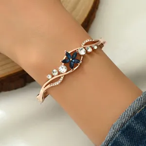 Rose gold flower crystal bangle bracelet detail view, elegant fashion women jewelry.