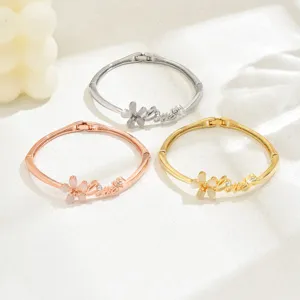 Triple color hinge bangle set with flower love charm for women daily fashion jewelry.