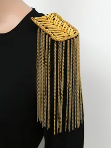 Spallina con nappe in metallo dorato per abiti e vestiti, elegante accessorio per spalle.
