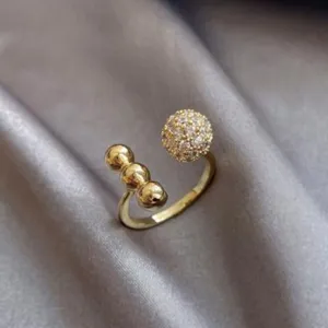 Minimalist gold open ring with multi spheres and pavé crystal ball, elegant daily jewelry variant