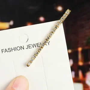 Rhinestone hair clip for women, sparkling crystal bobby pin, stylish hair accessory for girls.