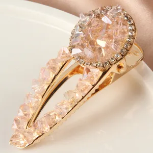 Pince a cheveux bec de canard doree avec cristaux et strass brillants pour femmes style.
