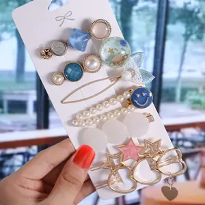 Korean fashion hair clip set, cute pearl and star hairpin designs for sweet daily styles.