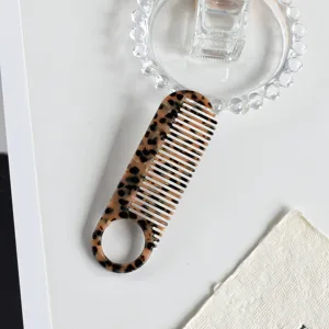 Acetate hair comb with tortoiseshell pattern anti-static portable styling tool detail