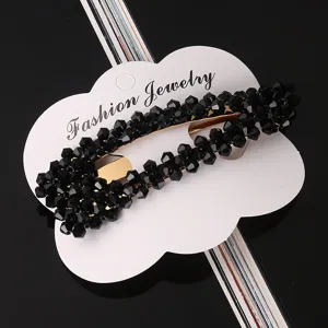 Vista de detalle de horquilla de cuentas de cristal negro, pasador elegante para mujeres.