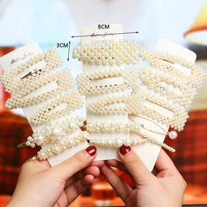 Elegant pearl hair clips set for women, versatile hair accessories for stylish daily hairstyles.