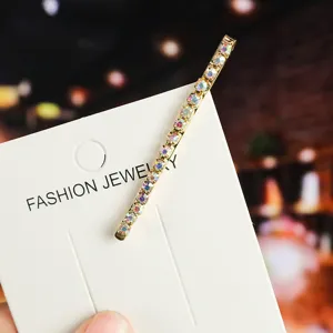 Rhinestone hairpin detail view, colorful crystal metal hair clip for women and girls daily wear.