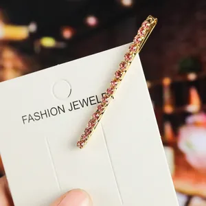 Rhinestone bobby pin hair clip for women, sparkling pink crystal metal barrette hair accessory.