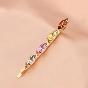Elegant gold hairpin featuring sparkling colorful marquise rhinestones for women hair styling.