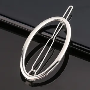 Silver metal oval hair clip minimalist hair barrette for daily styling and elegant updos accessory.