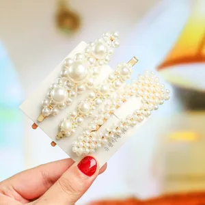 Elegant pearl hair clips set featuring four stylish Korean design side clips for women.