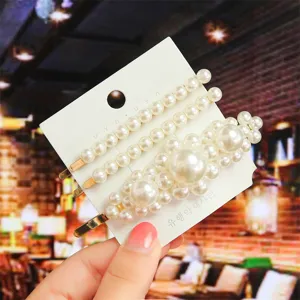 Korean pearl hair clip set for women, elegant metal side pins and fashion hair accessories.