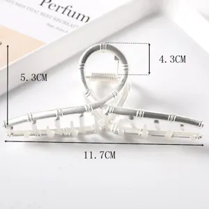 Detailed close-up of the large silver metal hair claw clip showing bamboo joint design dimensions.