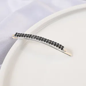 Crystal bobby pin detail shot featuring double row black rhinestones on a silver metal clip.
