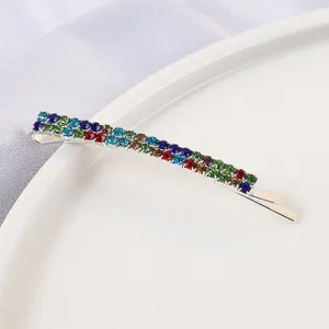 Close-up detail of the double-row colorful rhinestone bobby pin hair clip sparkling beautifully.