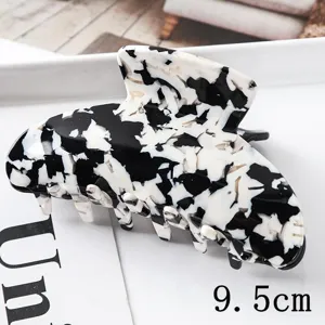 Grande pince a cheveux en acrylique noir et blanc motif pour coiffure elegante de tous