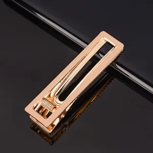 Barrette à cheveux en métal doré pince plate minimaliste pour femmes coiffure quotidienne.