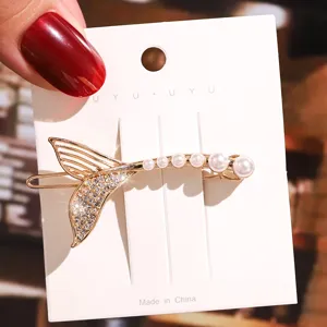 Pince à cheveux queue de sirène strass perle épingle dorée élégant accessoire de mode.