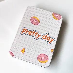 Cute printed iron storage tin box with donut pattern for organizing cute hair accessories.