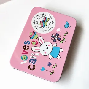 Pink metal storage tin box with cute rabbit and cupcake print, ideal for organizing hair clips.