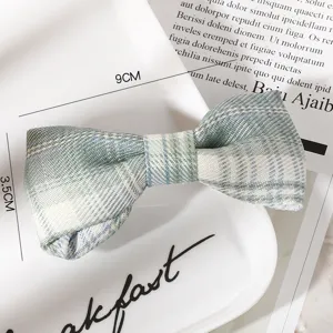 Green plaid bow hair clip, cute preppy style JK fabric hair barrette for women and girls daily wear.