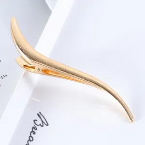 Elegant brushed gold S-shaped metal duckbill hair clip for stylish women's updos and daily wear.