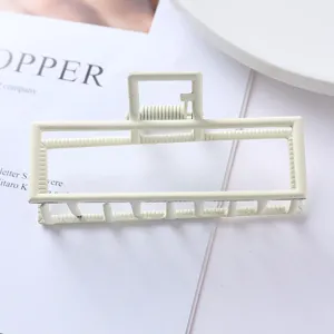 Minimalist white rectangular metal hair claw clip for elegant daily ponytails and hairstyles.