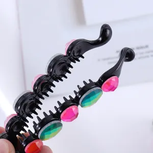 Crystal rhinestone banana clip, black plastic hair claw styling tool for elegant ponytails.