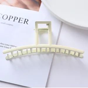 Minimalist cream white metal hair claw clip, elegant geometric arch hair accessory for women.