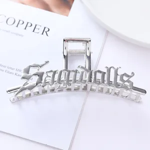 Silver metal hair claw clip with gothic letter design, stylish hairpin for daily styling.