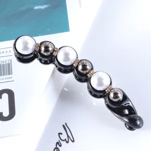Elegant pearl banana hair clip with rhinestones, black minimalist ponytail holder for women.
