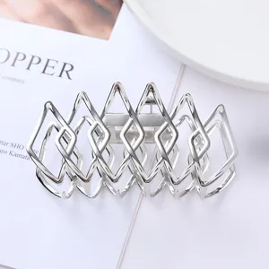 Silver metal hair claw clip with geometric hollow diamond design for daily elegant styling.