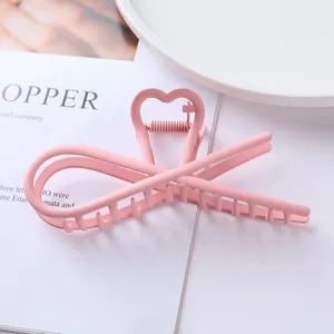 Pink metal hair claw clip cute heart cross design hair styling accessory for women daily wear