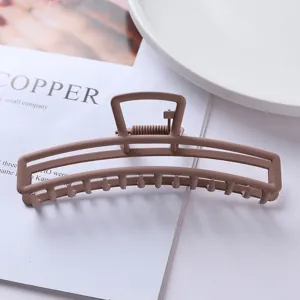 Matte brown metal hair claw clip minimalist geometric design sturdy hair styling accessory