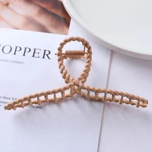 Matte nude geometric metal hair claw clip for elegant women daily ponytails and buns styling.