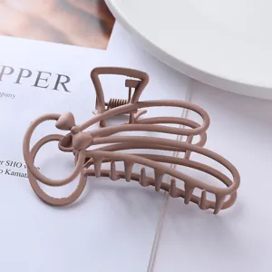Matte metal hair claw clip with cute bunny shape design in neutral brown color for daily.