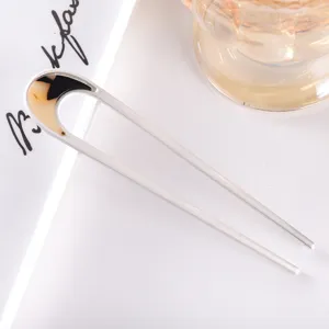 Minimalist U-shaped hair fork detail shot, metal and acetate hair pin for women daily styling.