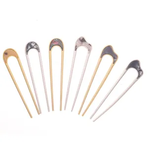 Modern minimalist U-shaped hairpins set, frosted metal and acetate styling for elegant hair buns.