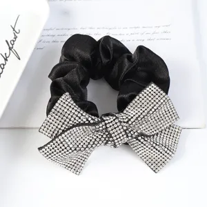 Black fabric hair scrunchie with sparkly rhinestone bow for women elegant daily wear accessory
