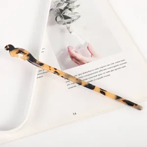 Minimalist tortoiseshell acetate hair stick, elegant hollow vintage hairpin for women hair buns.